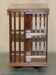 Sheraton Revival rotating library table in walnut and satin wood.
