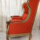 Fauteuil à oreilles en bois sculpté doré signé Maison Dienst Paris XIXeme siècle