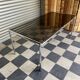 Chrome table and smoked glass