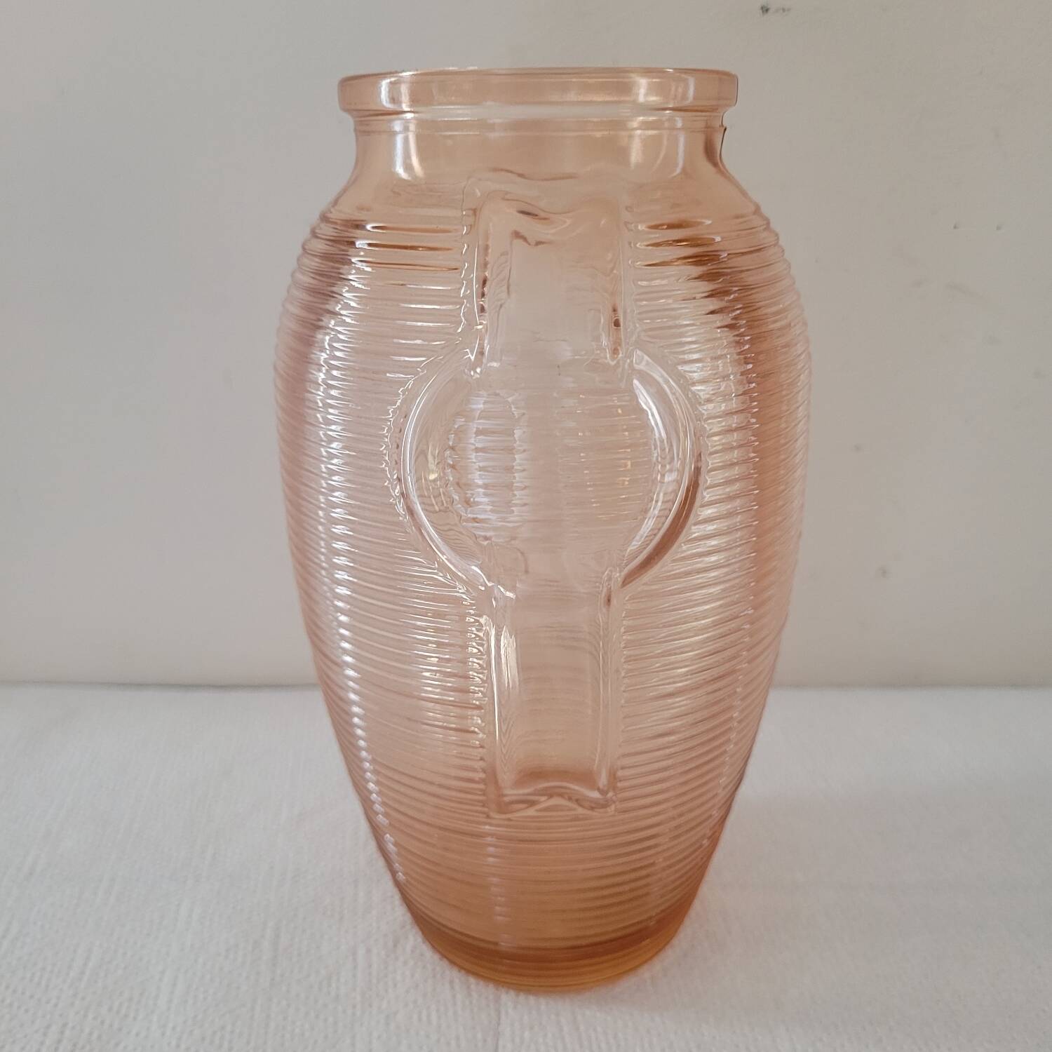 Salmon-colored Art Deco pressed glass vase