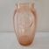 Salmon-colored Art Deco pressed glass vase
