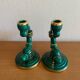 Pair of green and gold ceramic candlesticks