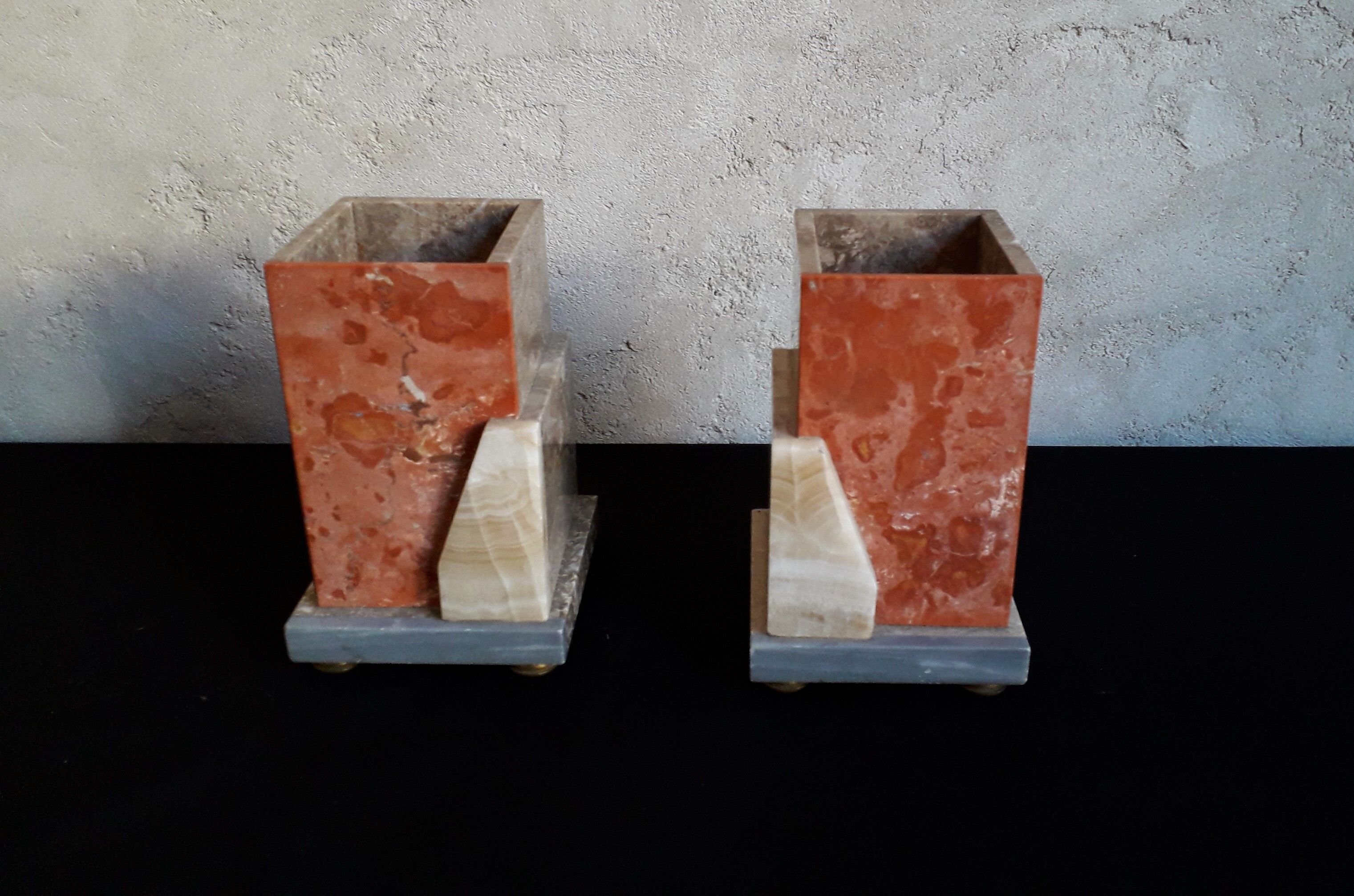 Pair of marble and onyx book clamts