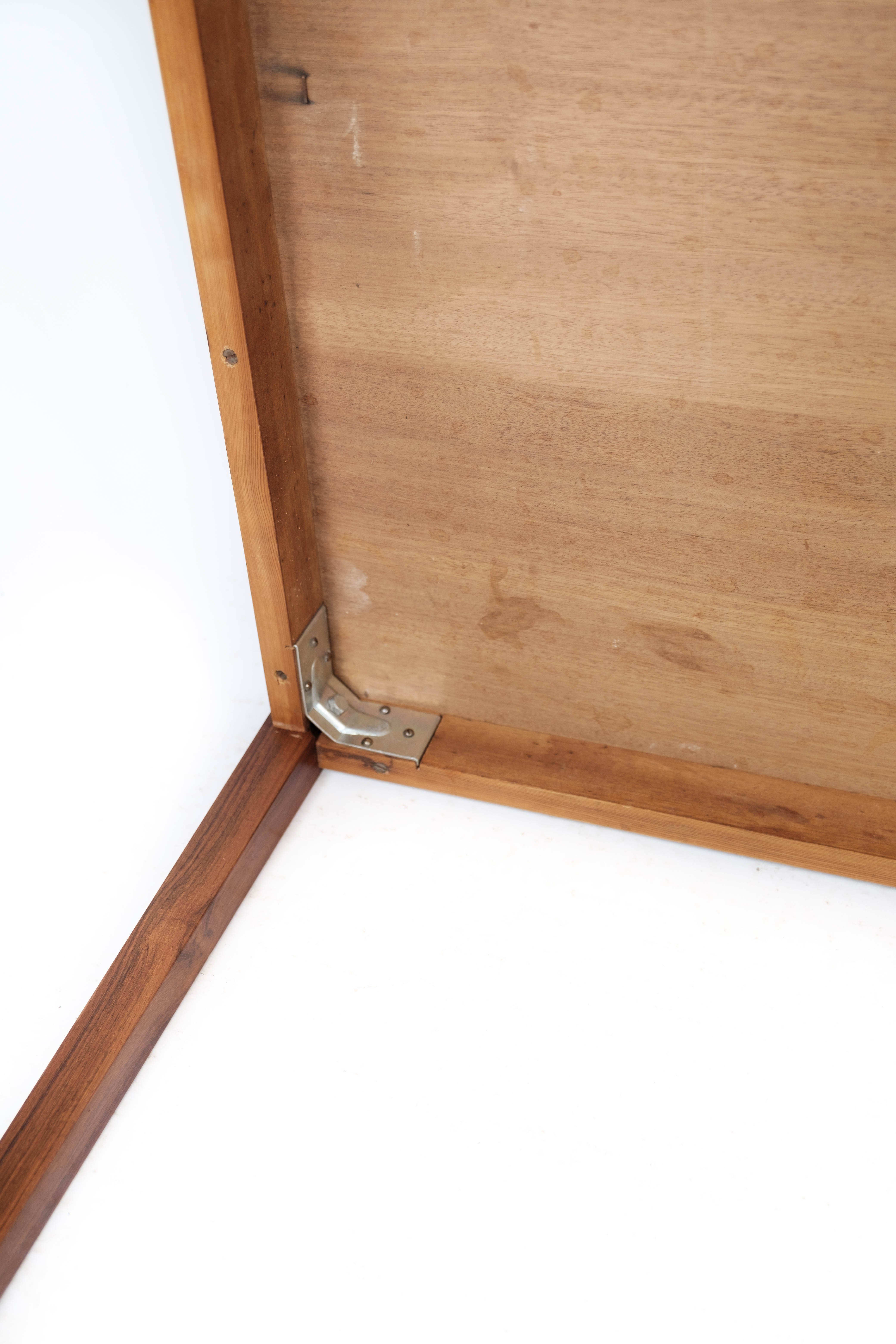 Coffee table in rosewood with blue tiles of Danish design from the 1960s