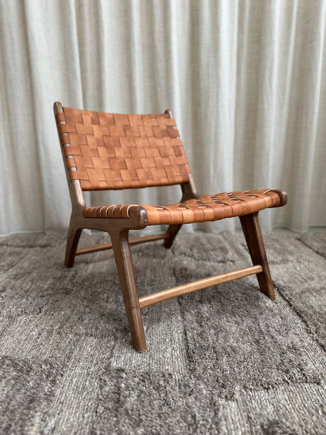 Pair of leather and walnut armchairs