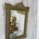 Antique mirror with a pediment