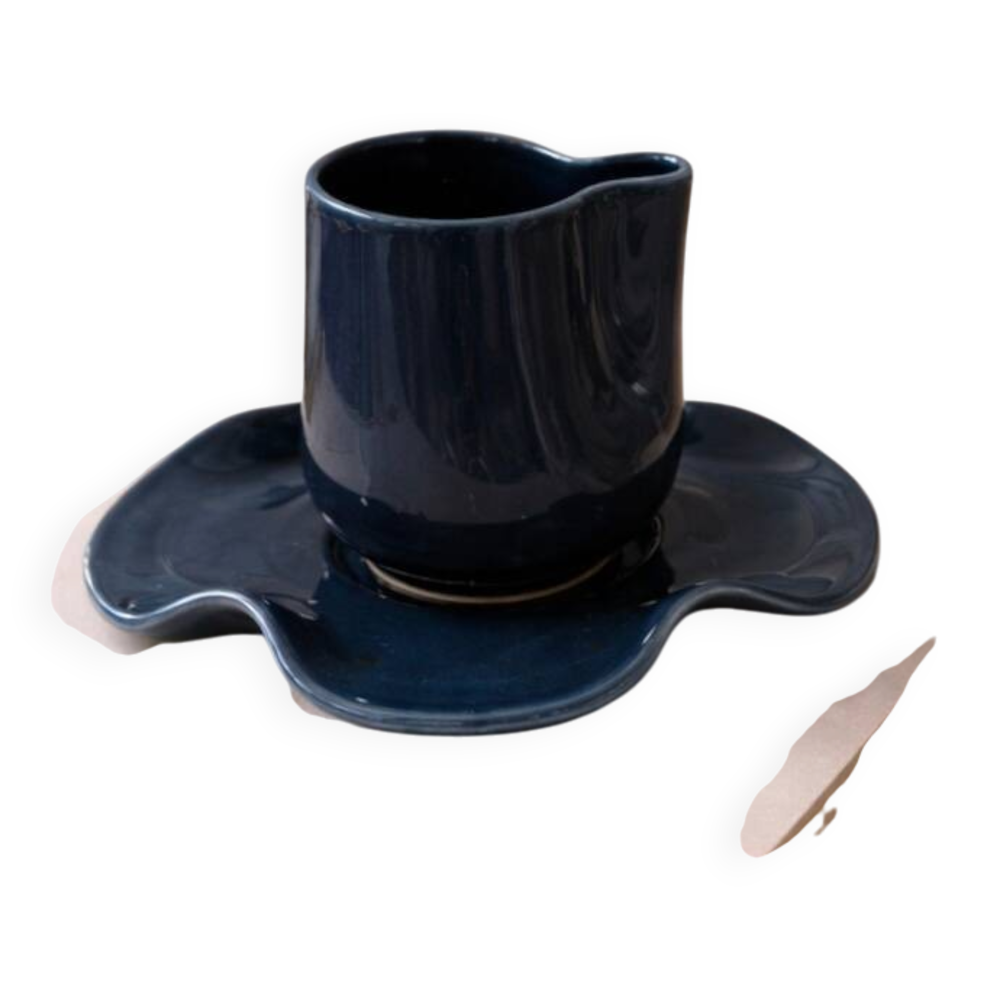 Set of wavy ceramic cup and saucer - petrol blue