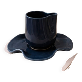 Set of wavy ceramic cup and saucer - petrol blue