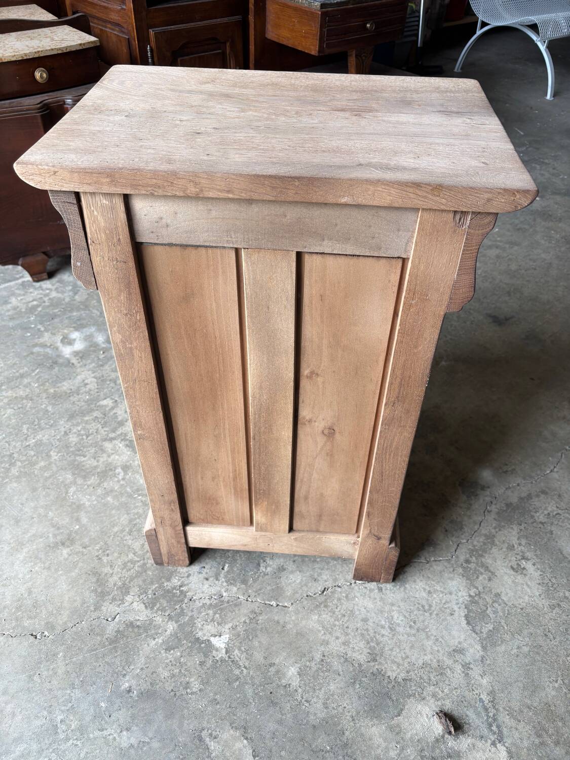 Raw wood bedside table
