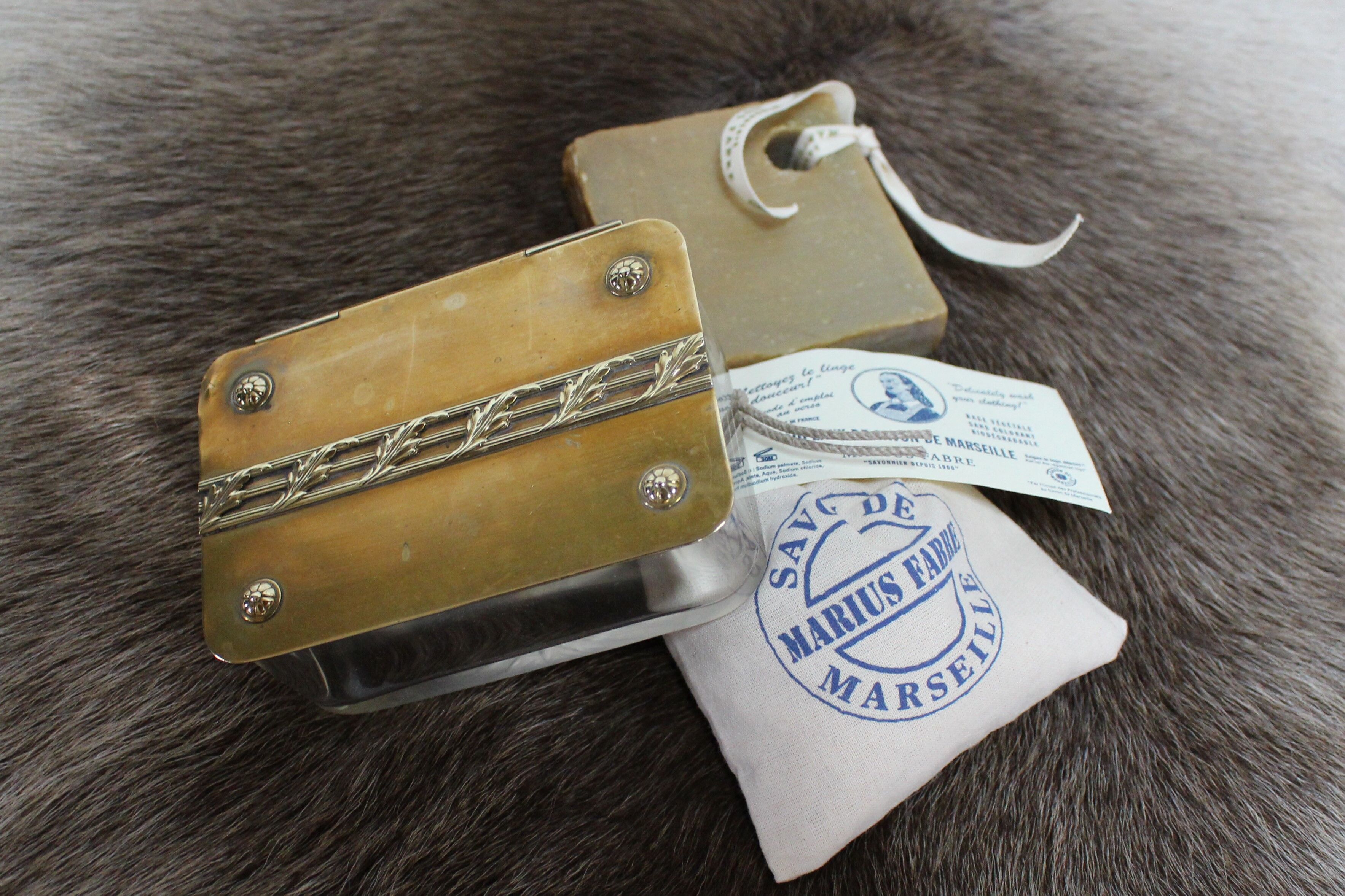 Chiseled glass soap box and brass lid