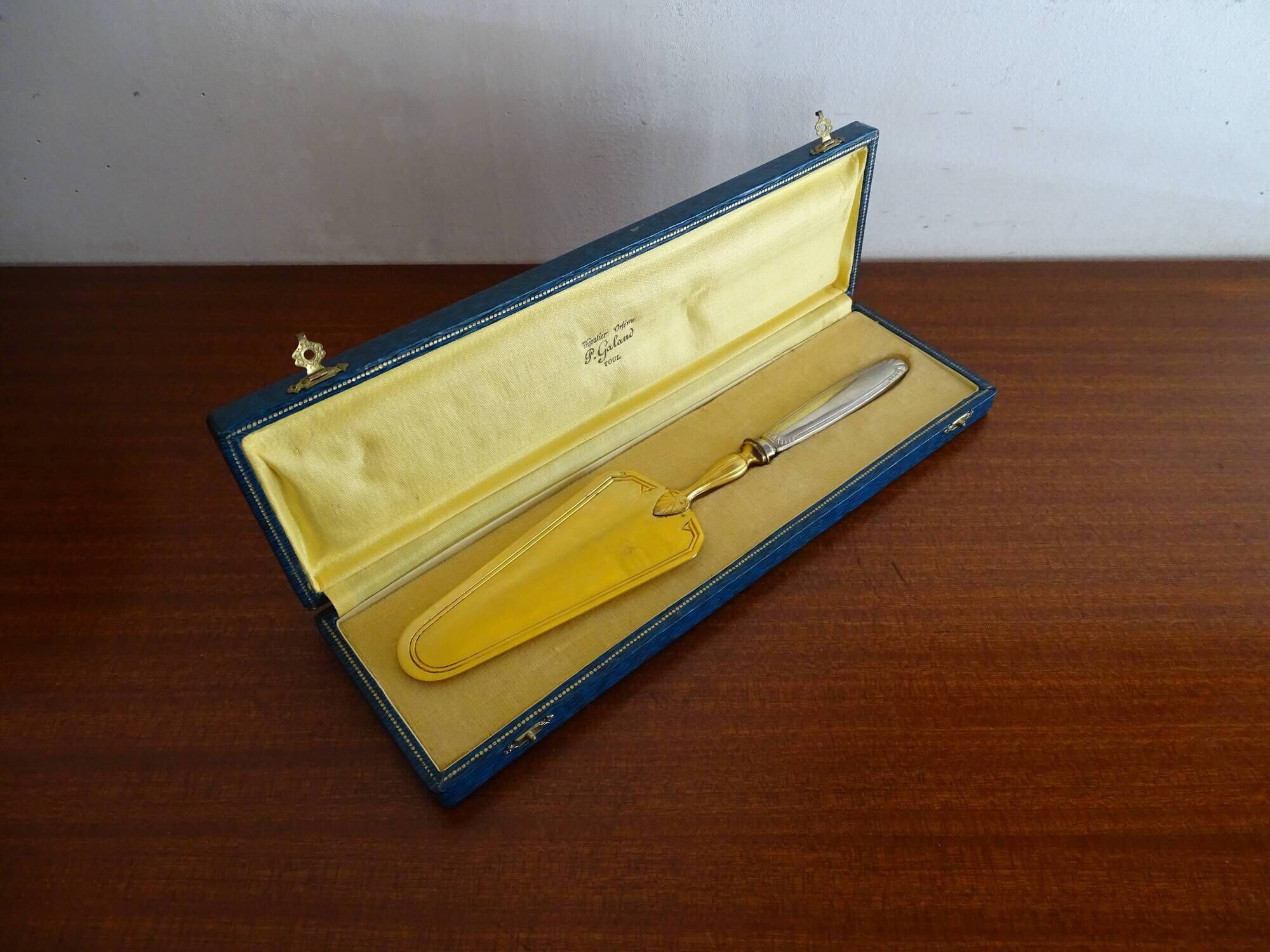 Antique silver and gilded metal pie shovel in case