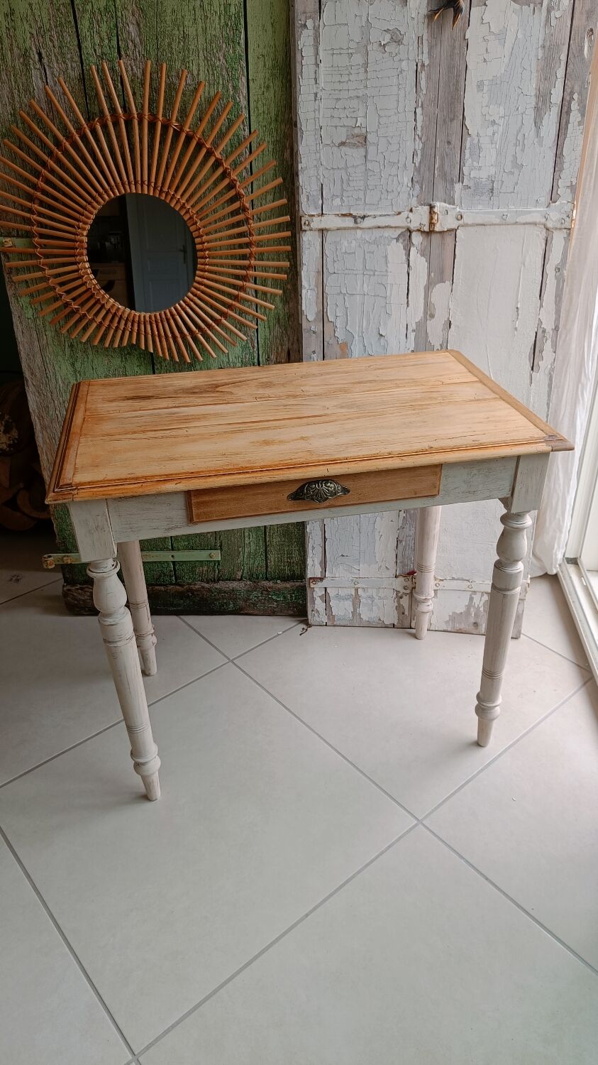 Antique wooden desk with a patinated base