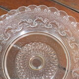 Duo of molded glass display cups, arabesque décor