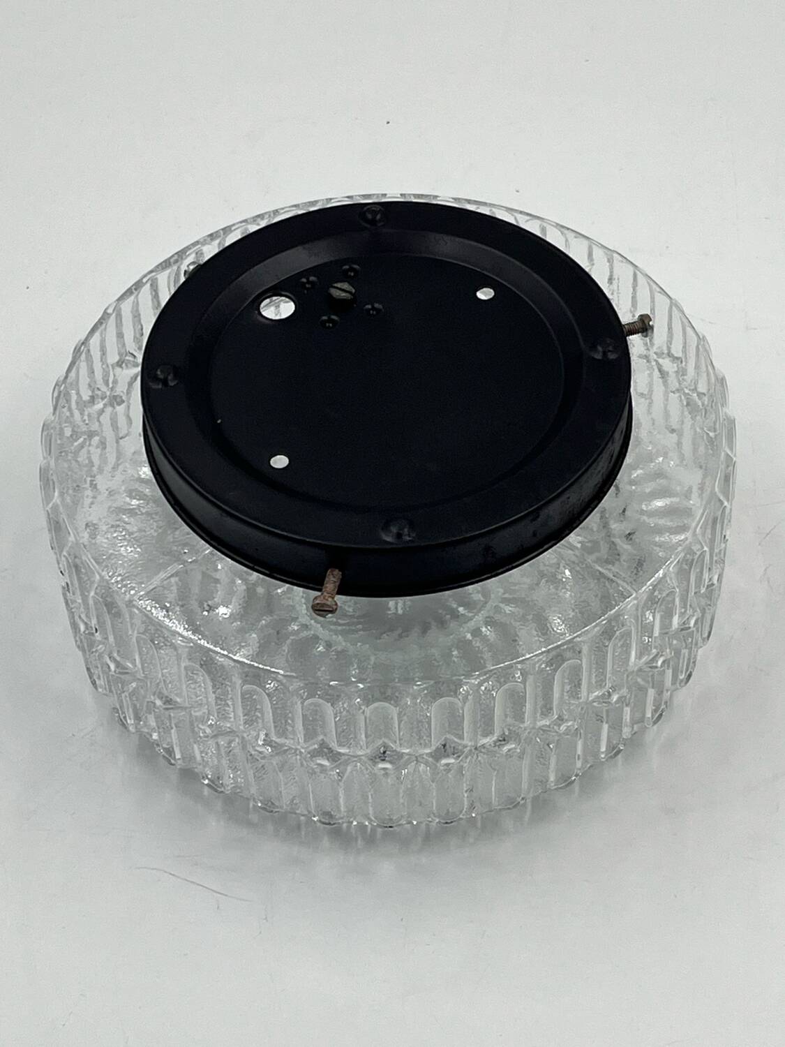 Molded glass ceiling light with relief