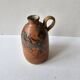Ceramic handle soliflore vase with an unidentified signature
