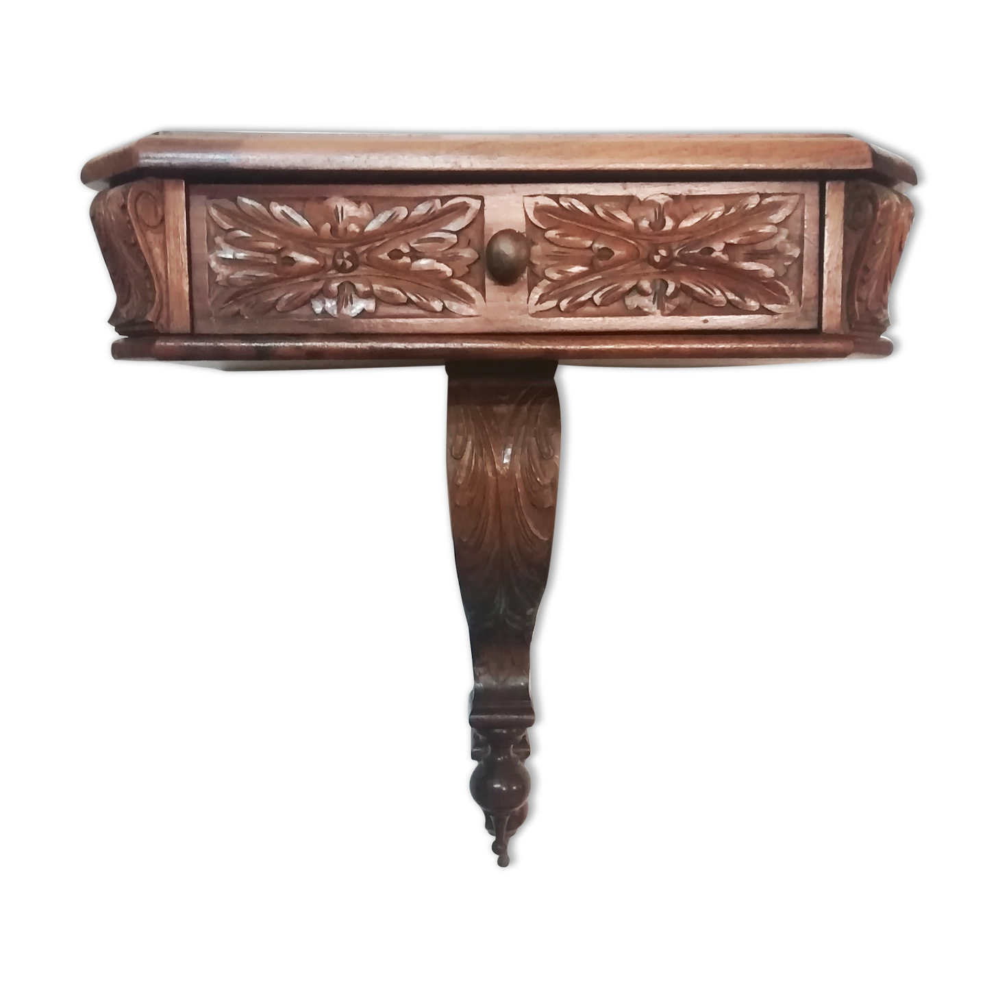 Carved wood side table. 1950s