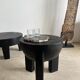 Black mango wood tripod side table with a semi-spherical top, height: 45 cm, diameter: 44 cm.