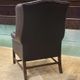 Chesterfield armchair with brown leather ears from the 1990s in very good condition