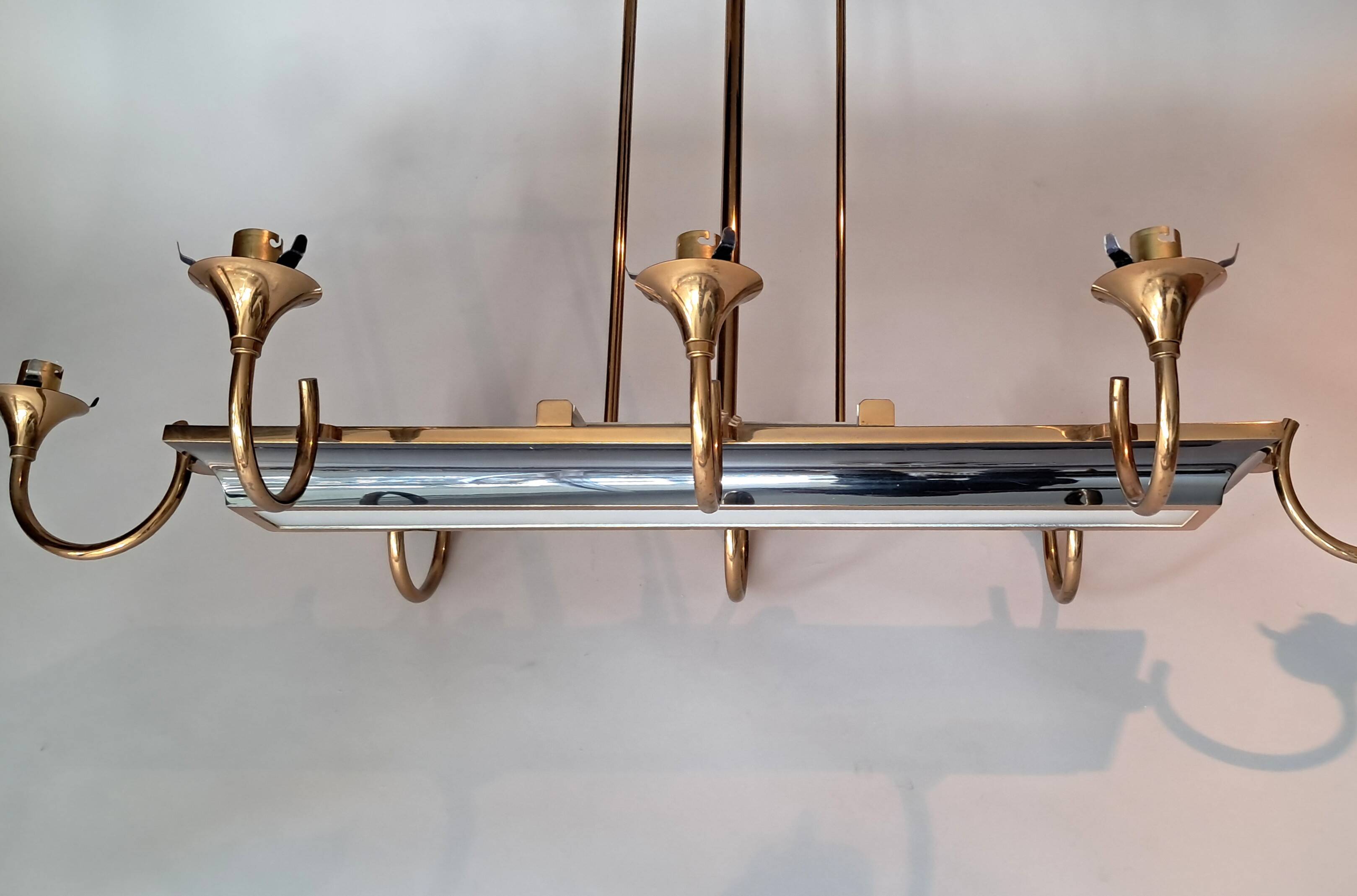 Eight-light chandelier in gilded brass and blue, 1950.