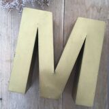 Golden vintage sign letter M