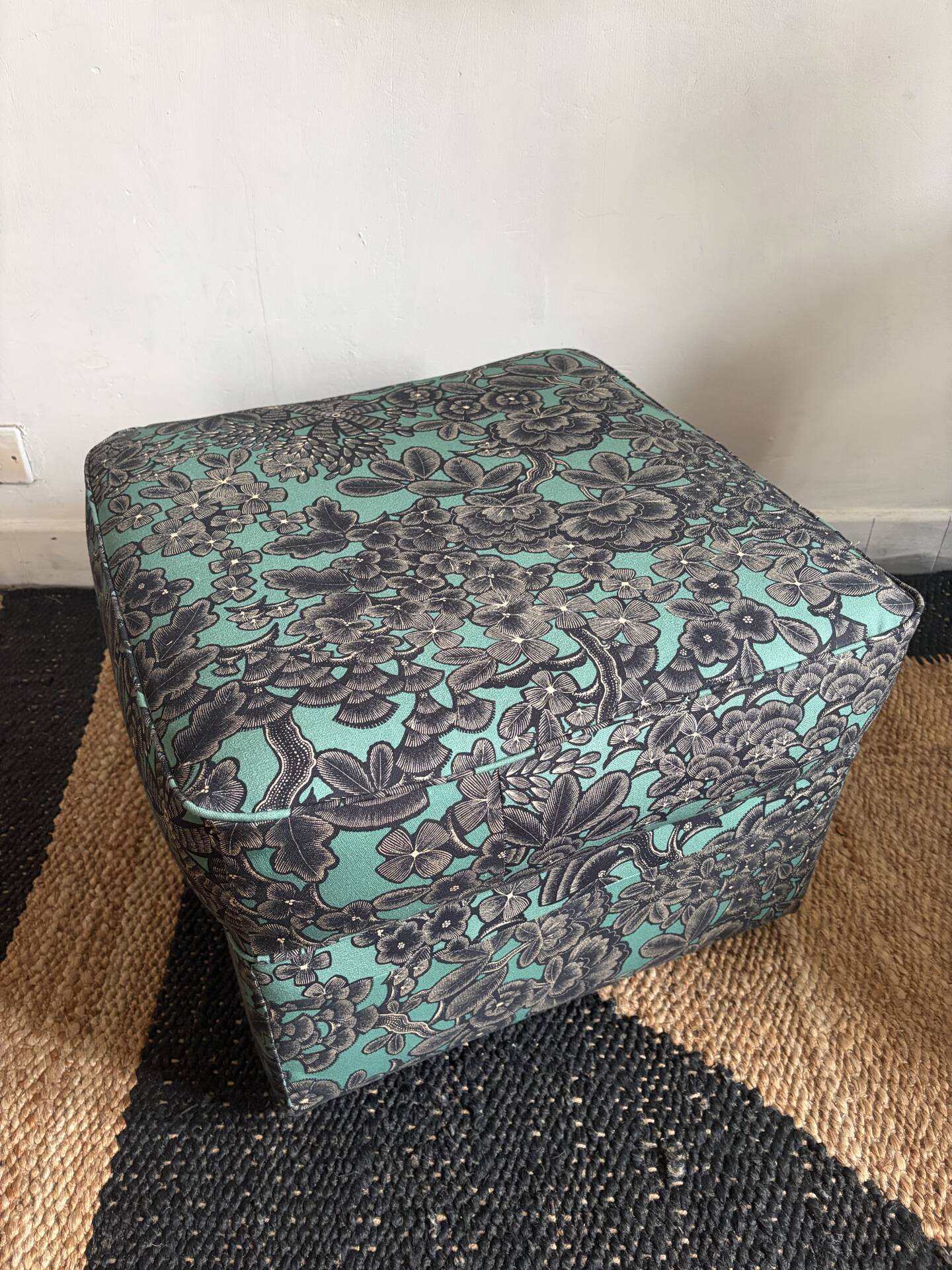 Upholstered pouffe