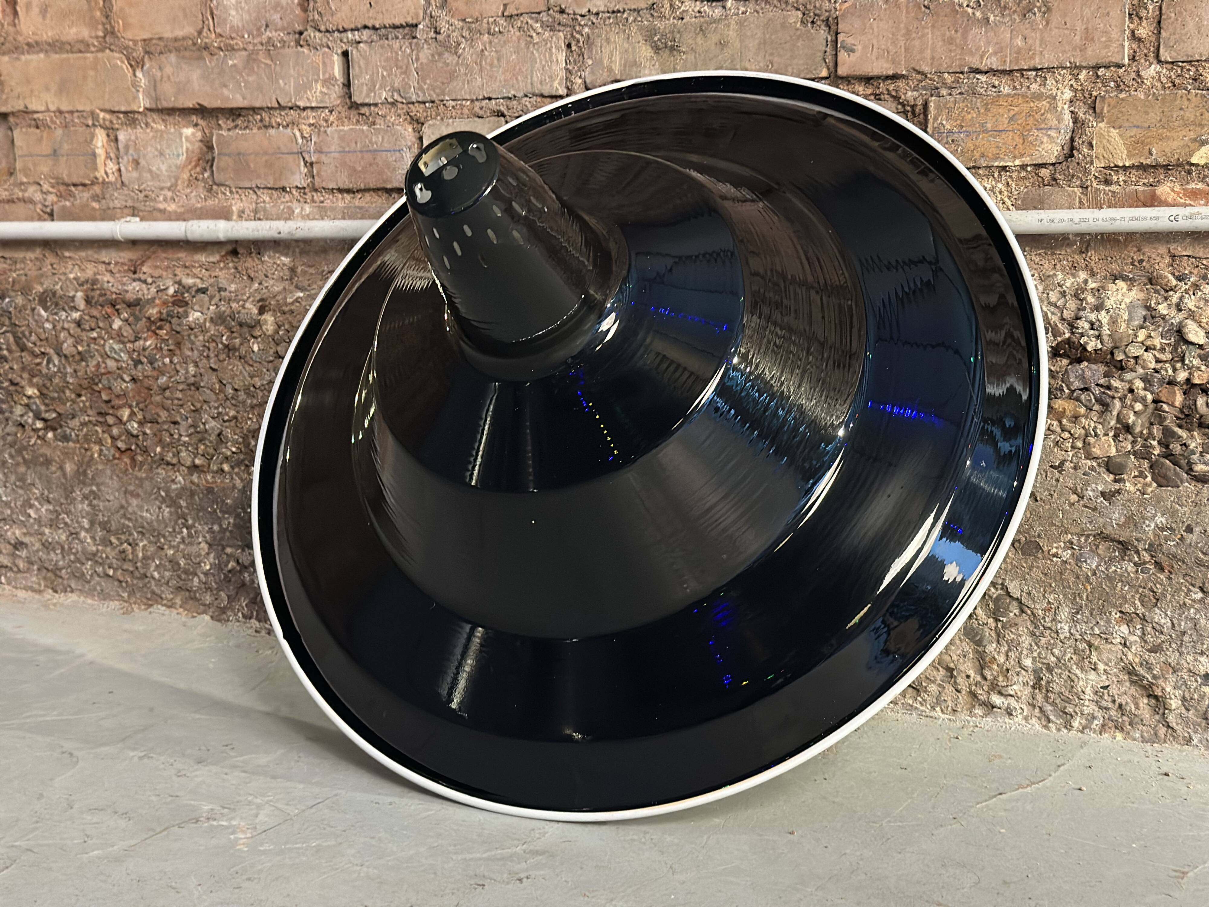 Large industrial pendant lampshade in black enamelled sheet metal.