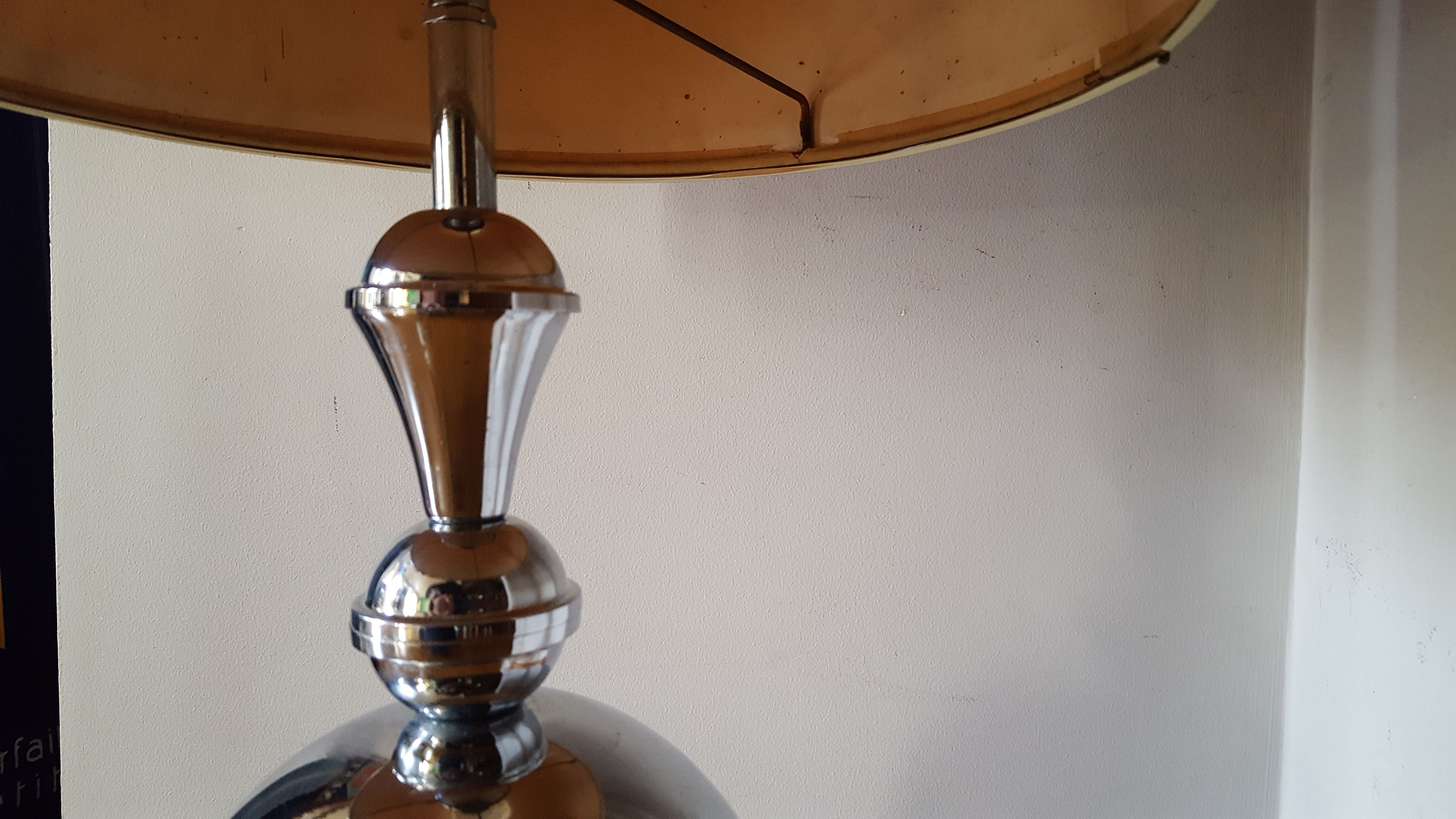 Vintage chrome lamppost from the 70s with its dayof