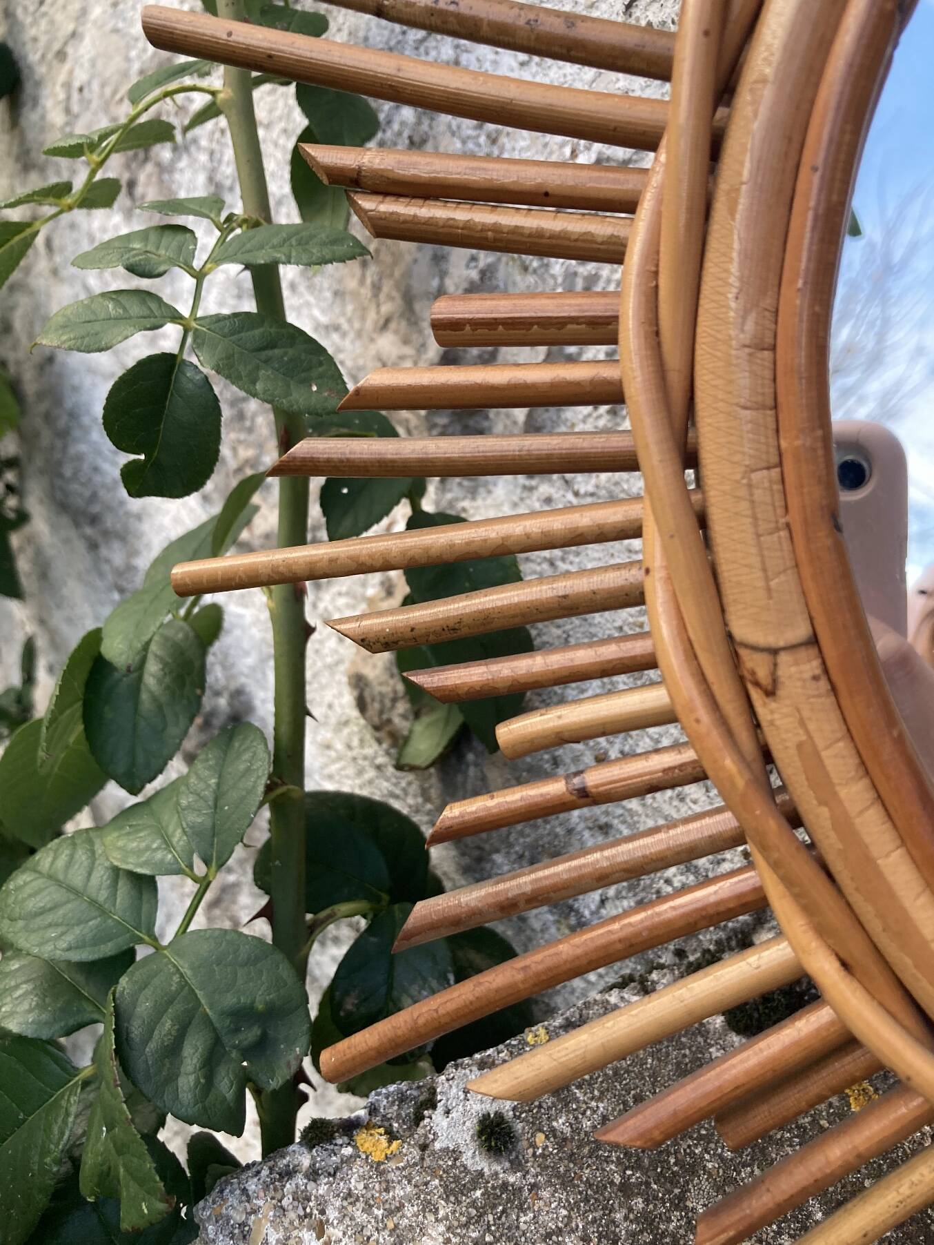 Vintage rattan sun mirror