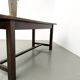 Solid pine workbench, grooved top, satin brown finish.