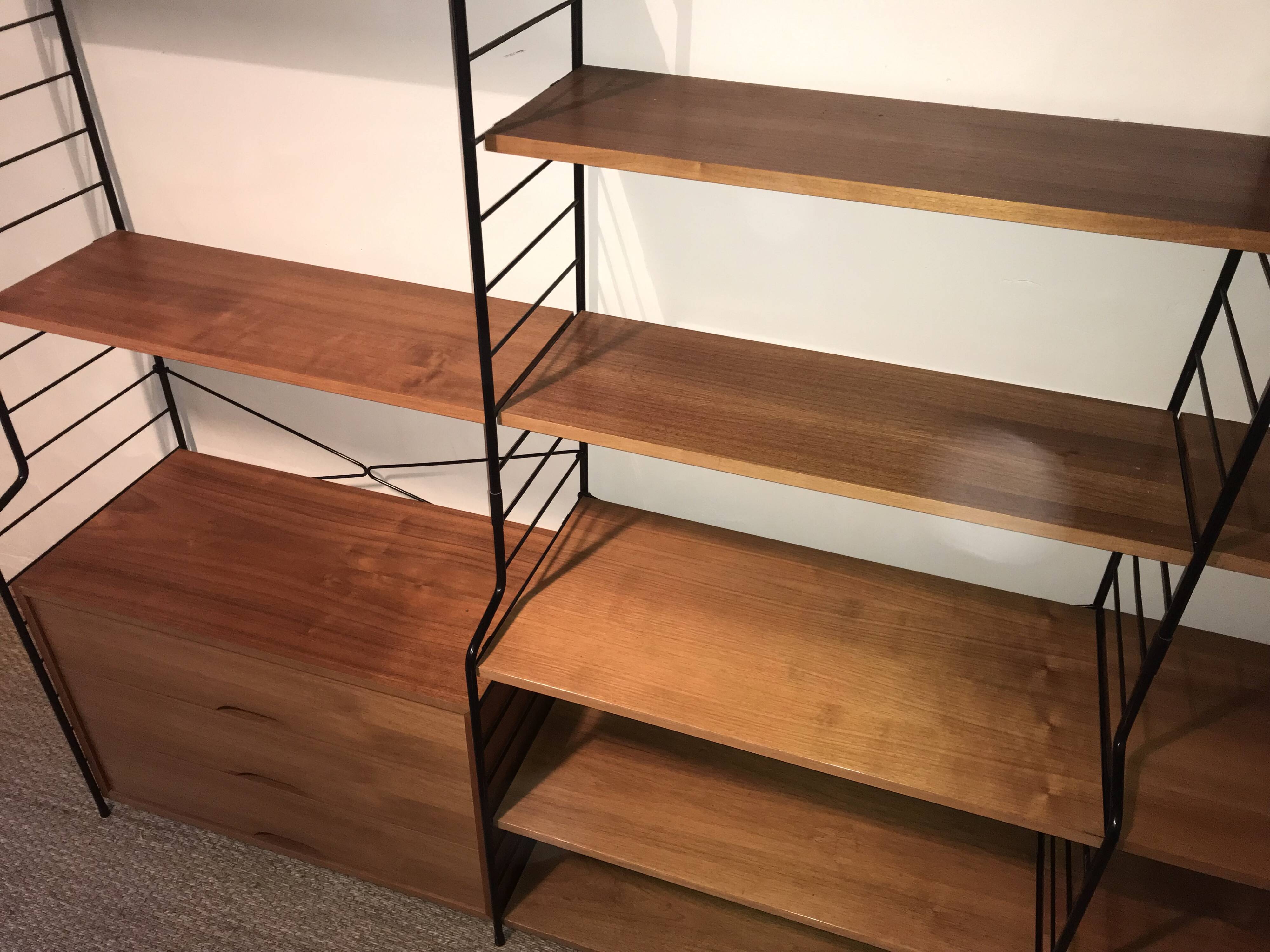 Vintage modular wall-mounted library shelf in blond walnut 1960-80