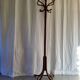 Ancient parrot coat rack