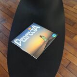 Elliptical coffee table by Charles and Ray Eames