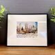 Print by Michael J. Leu – winter urban scene – framed