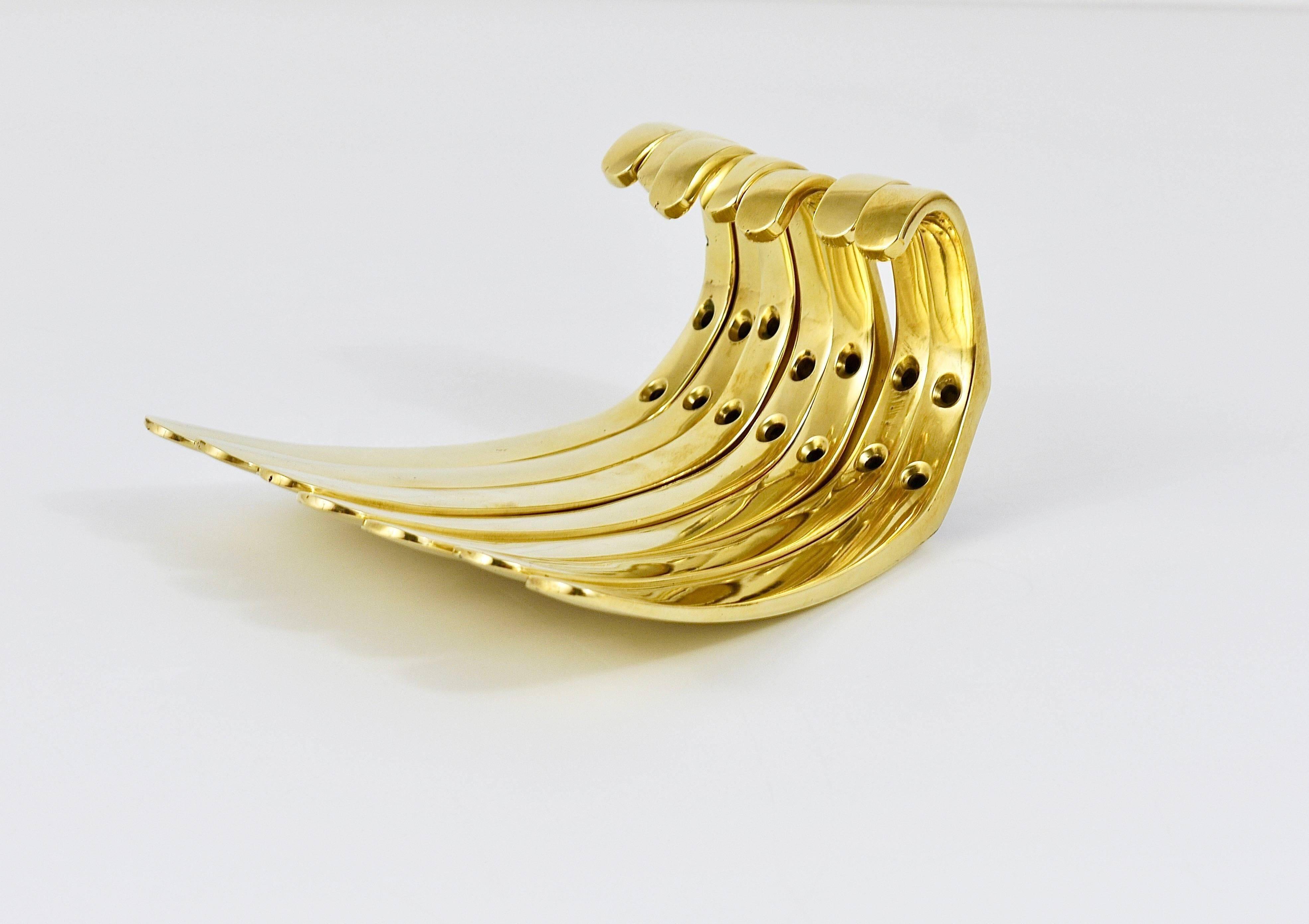 Up to four mid-century brass wall hooks by Herta Baller, Austria, 1950s.