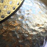 Stoneware lamp with cane shade