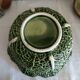 Large soup tureen in the shape of a cabbage.