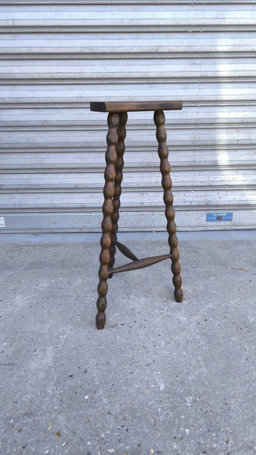 Turned wooden tripod stool