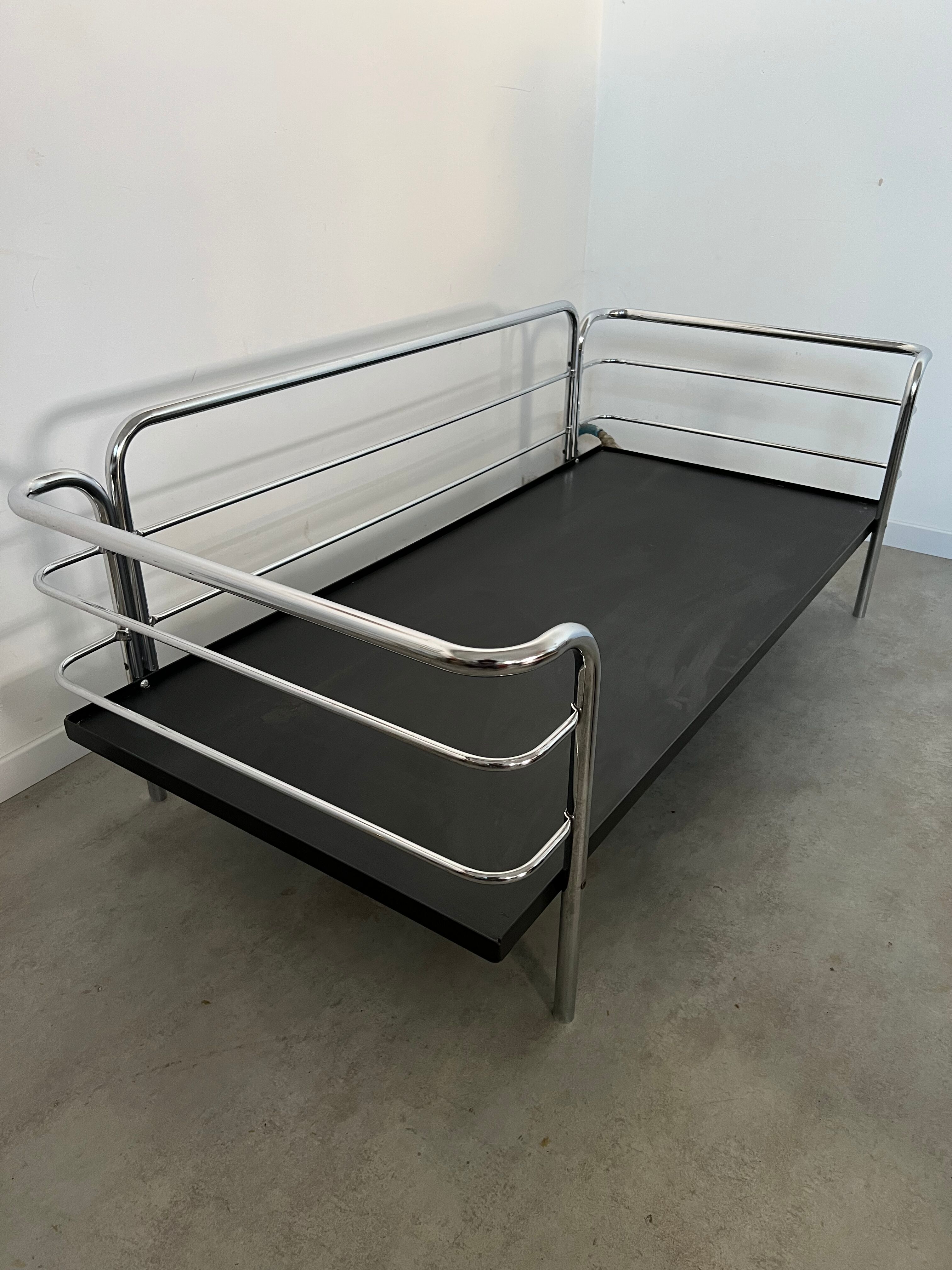 Old vintage leather and tubular metal sofa, design 70s