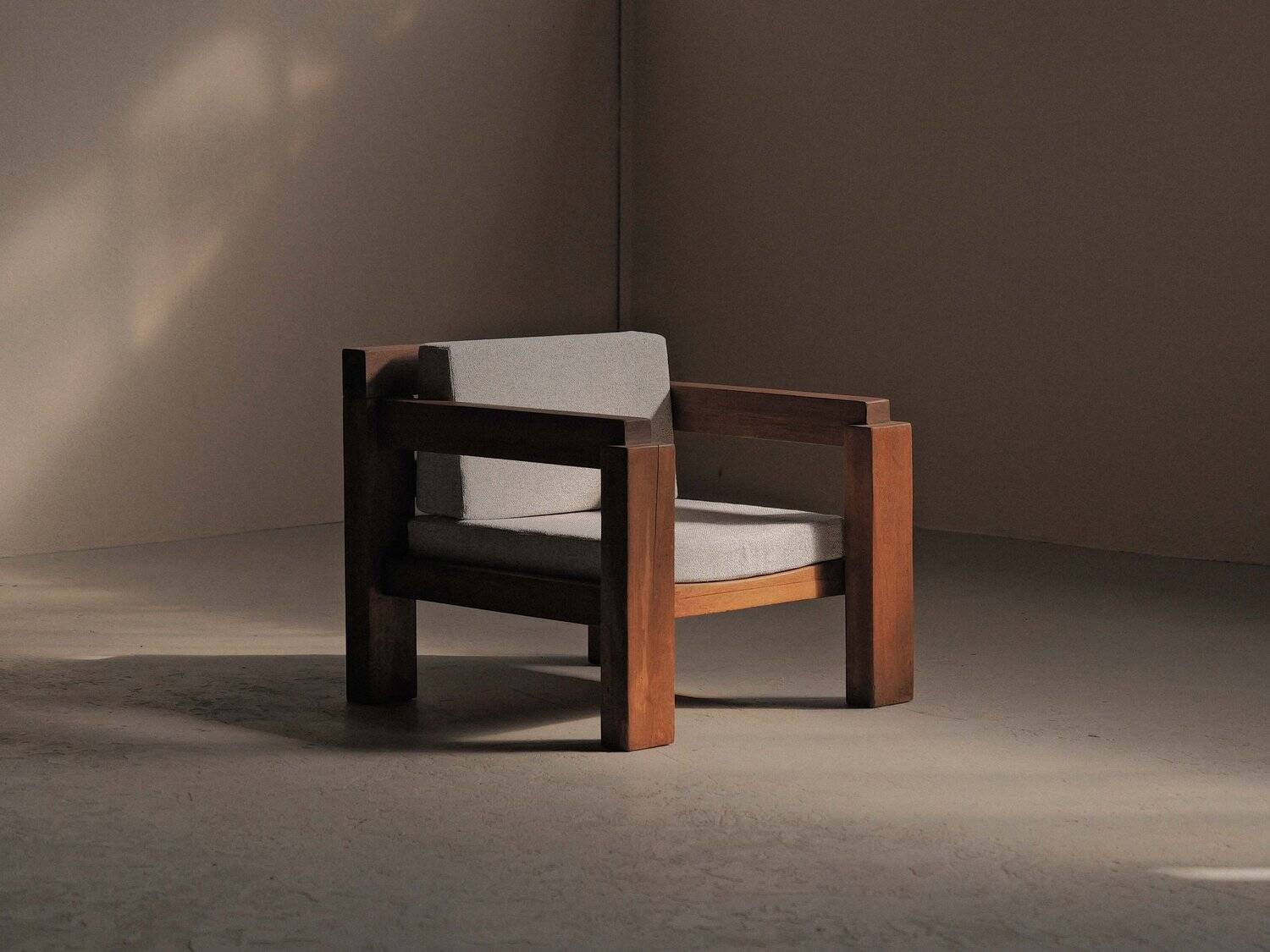 Handcrafted armchair in solid wood and fabric, 1980s-90s.