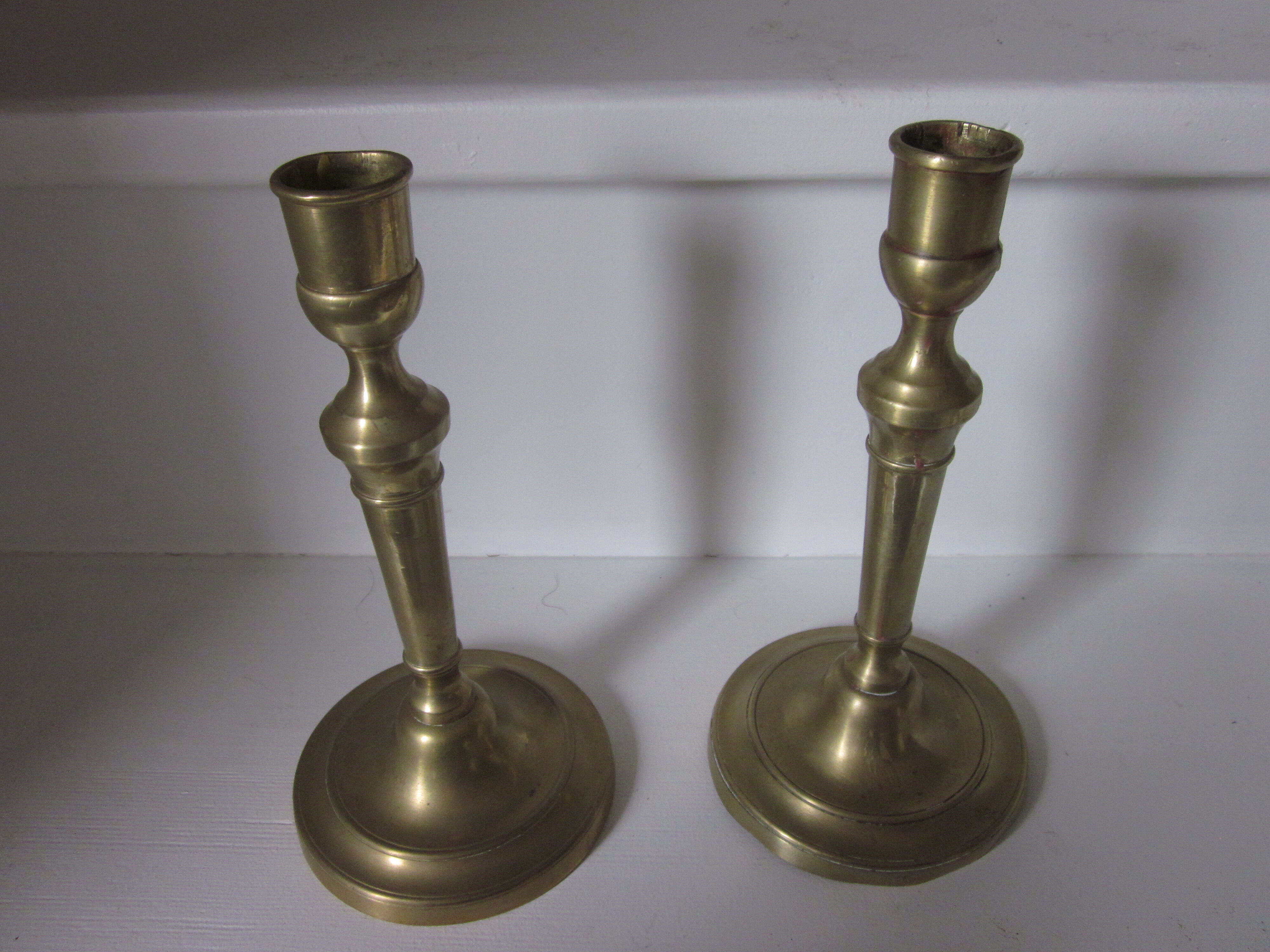 Pair of old bronze candlesticks