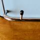 Vintage wall-mounted coat rack in wood and chrome metal with mirror