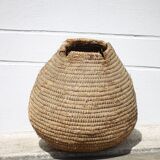 Old basket, burgundy straw and bramble, woven basket, interior decoration, pantry, flowerpot