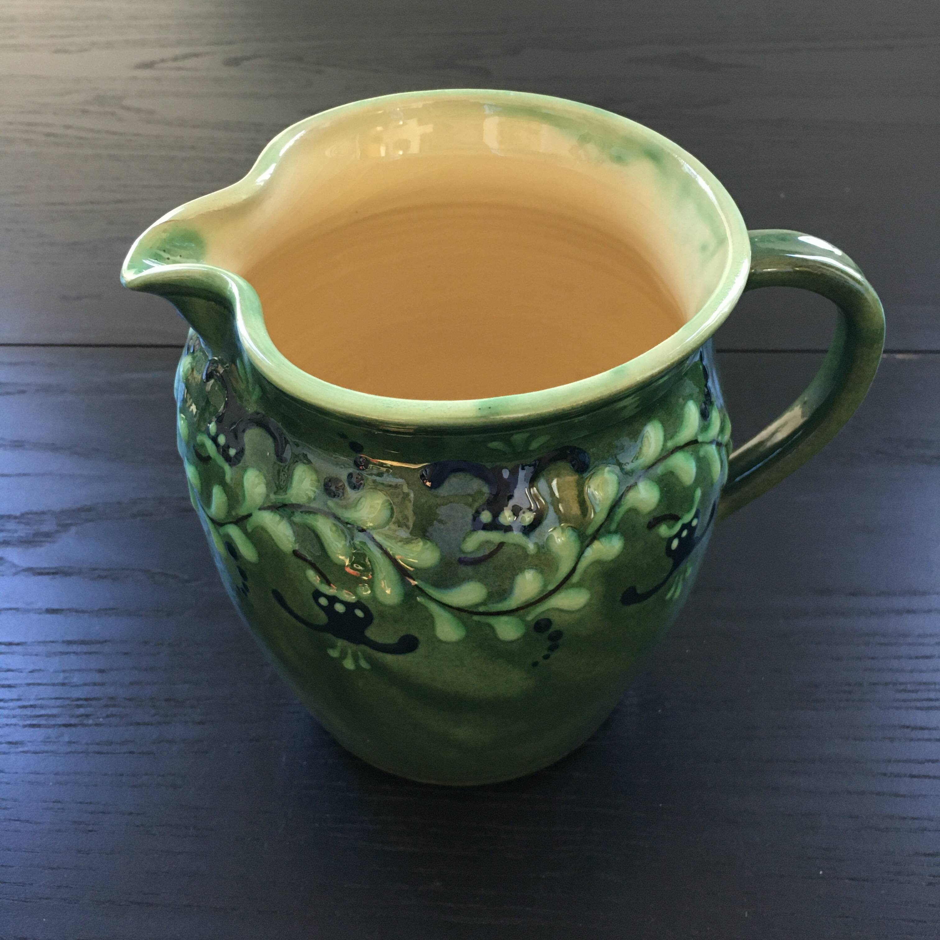 Large pitcher with floral decoration