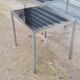 Pair of side tables in chrome metal and glass
