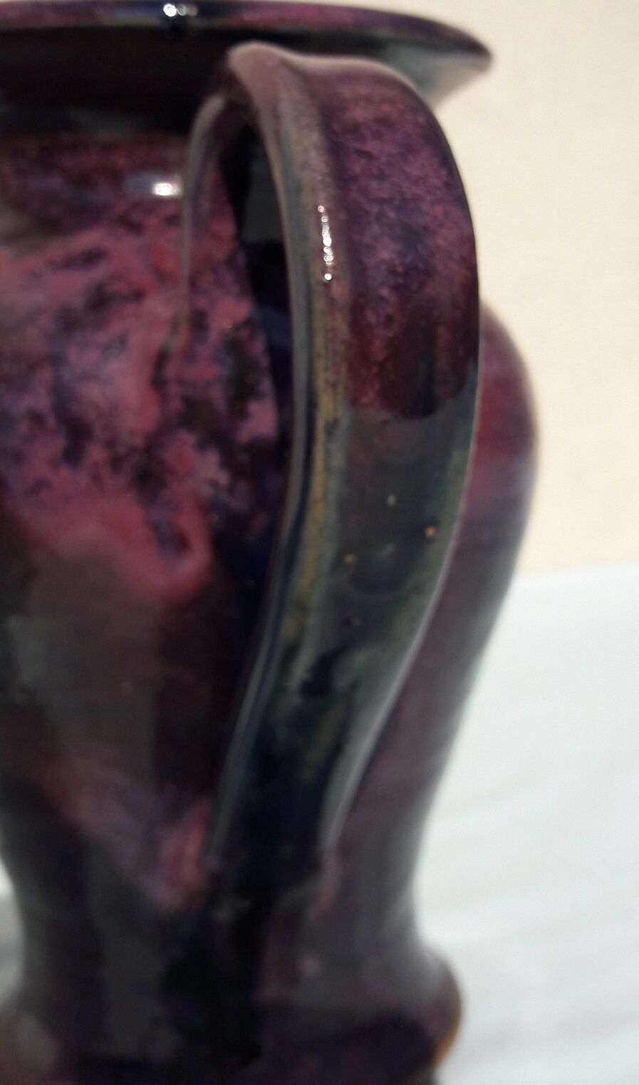 Signed ceramic pitcher