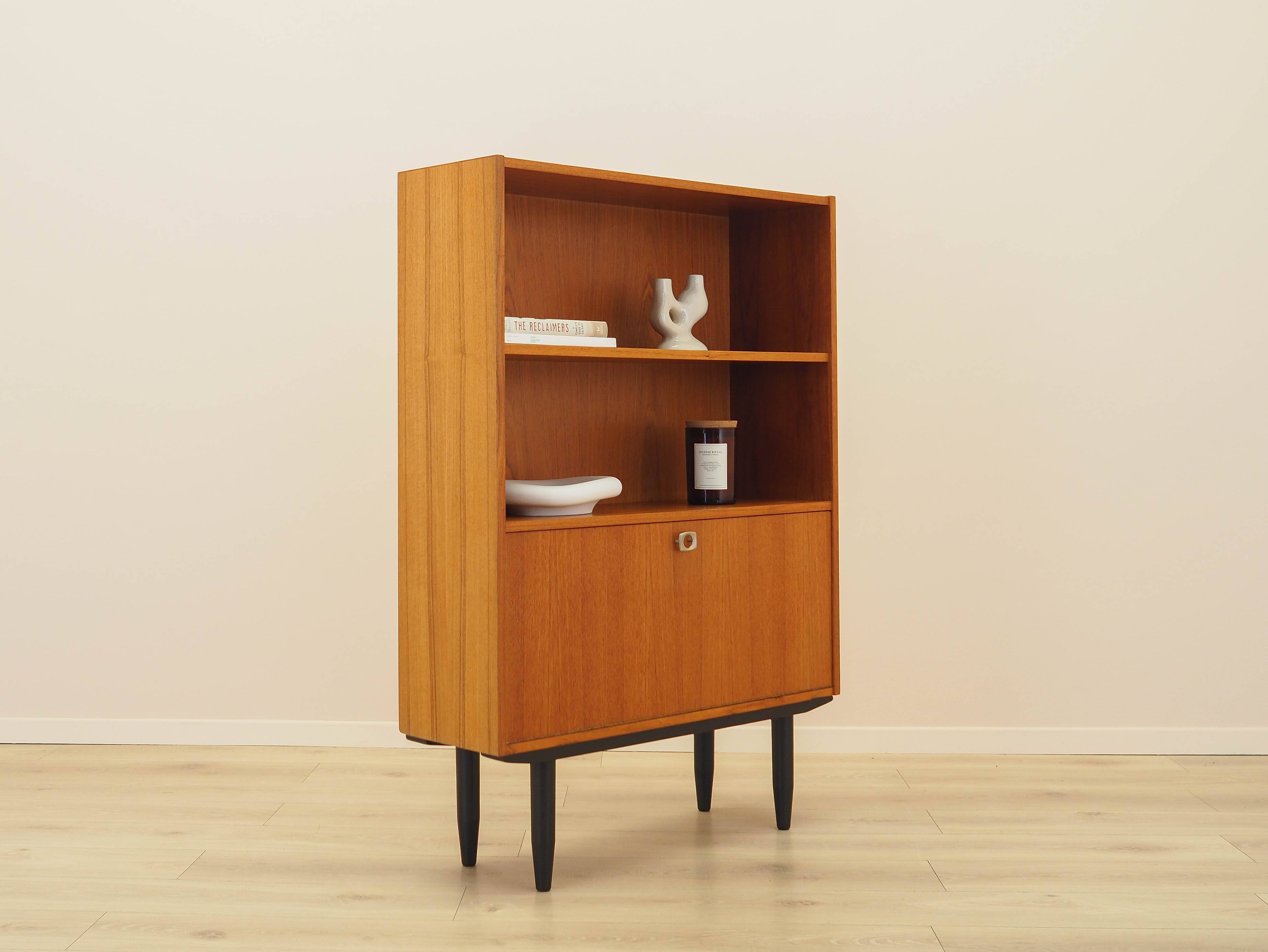 Danish teak-veneered bookcase with a bar and adjustable shelves, 1970s.