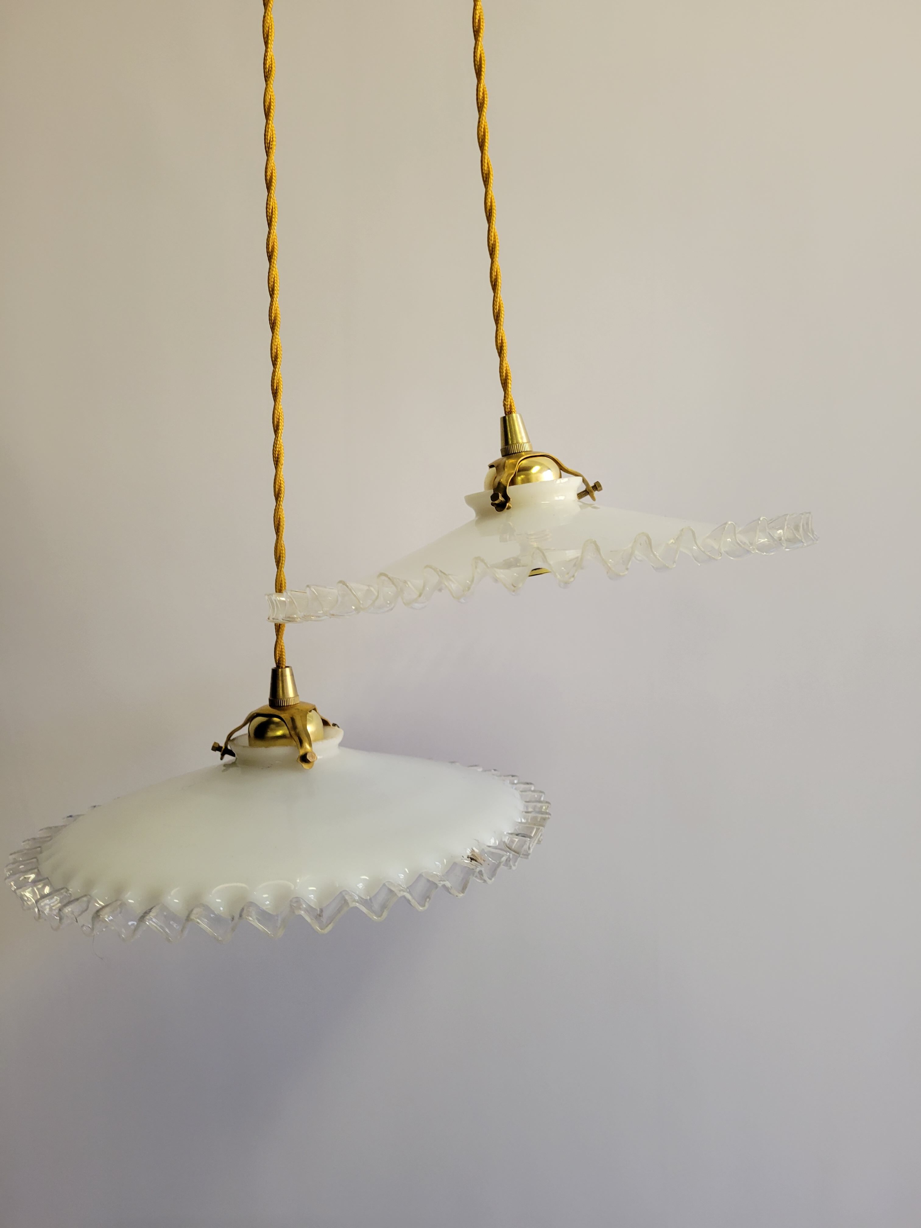 Duo of serrated opaline suspensions