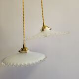 Duo of serrated opaline suspensions