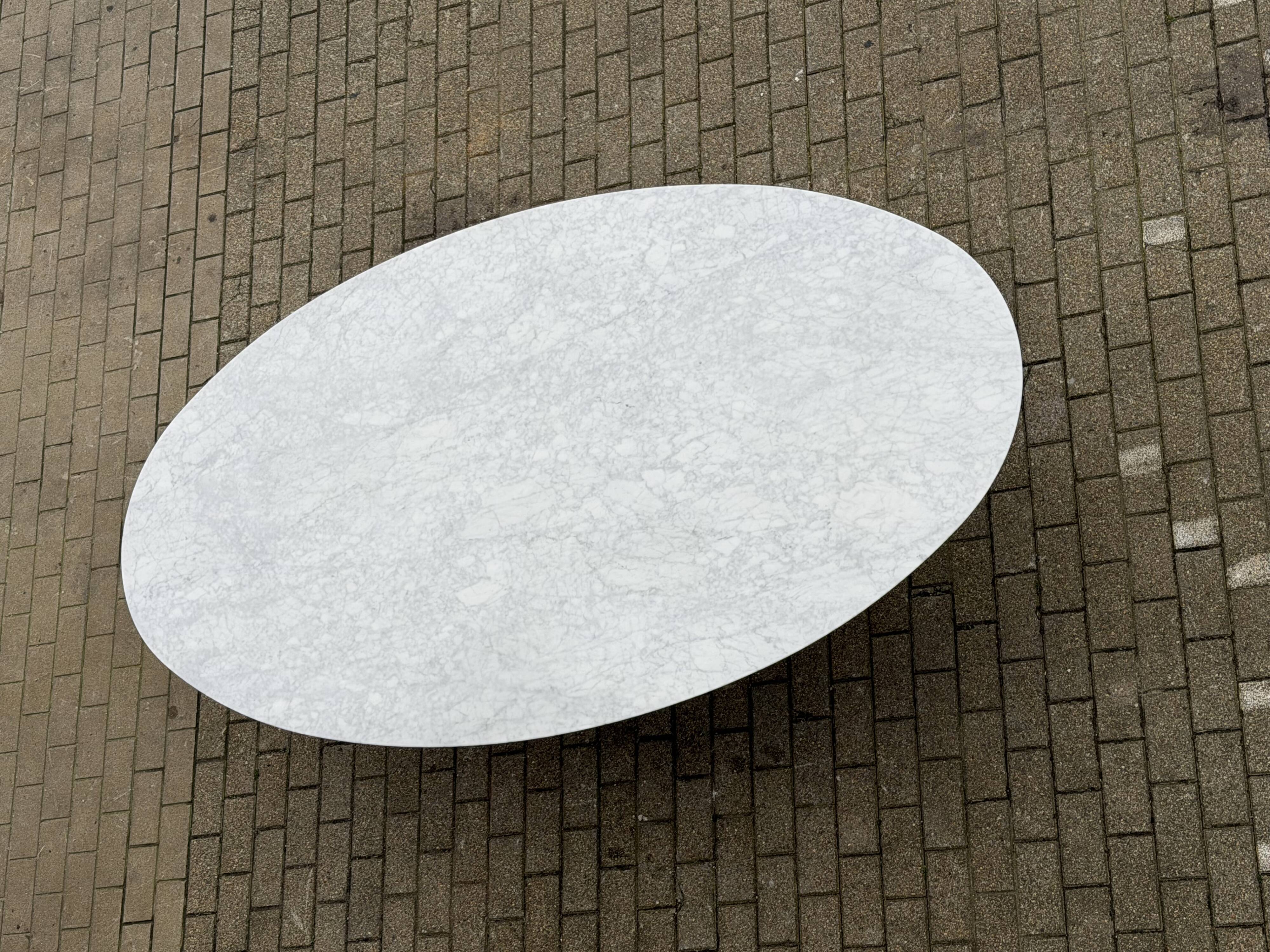 Original Knoll Tulip oval dining table (244cm) in Carrara marble.