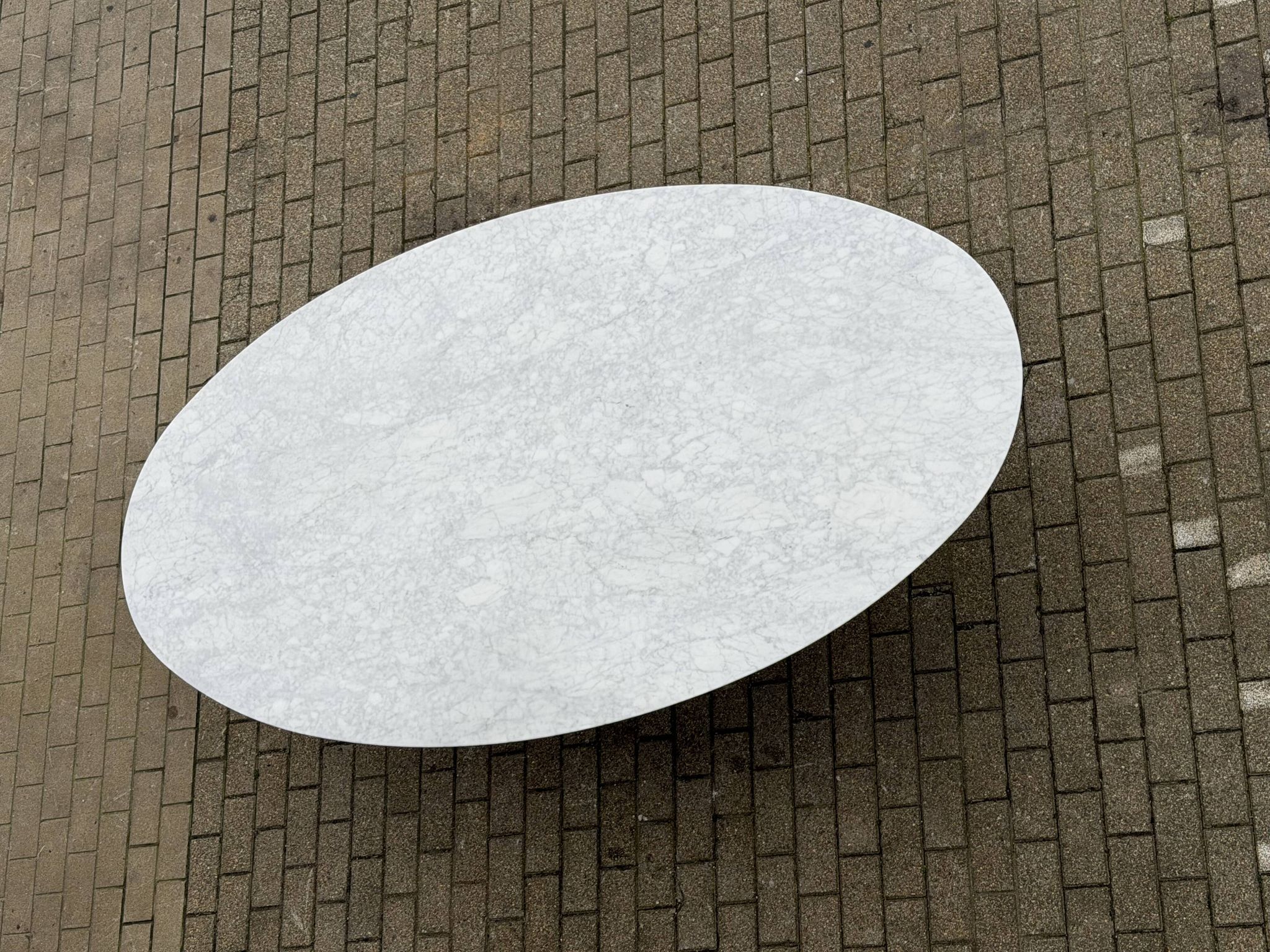 Original Knoll Tulip oval dining table (244cm) in Carrara marble.